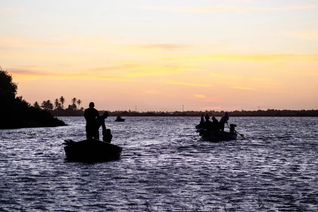 Fishing boats on the lagoon at dusk
